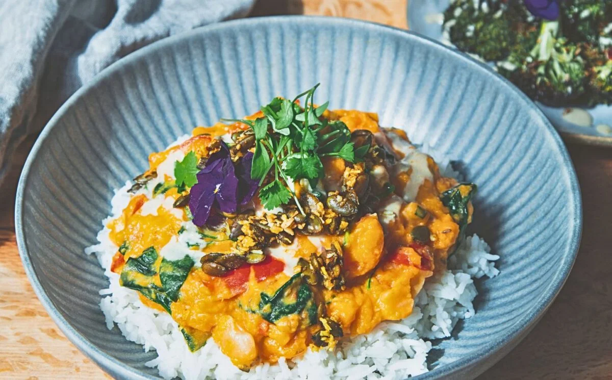 butter bean and sweet papas coconut stew with spicy and sweet coconut pepitas