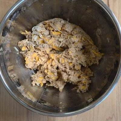 Red wheat cheddar bay biscuit dough in bowl