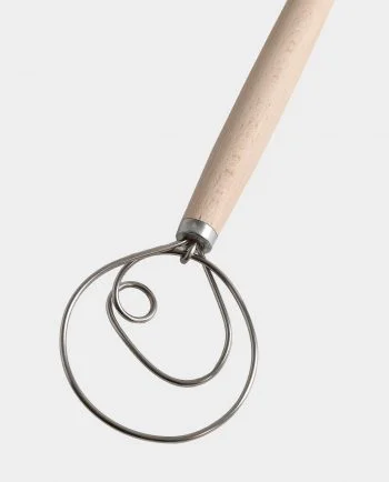 a metal pastry cutter tool.