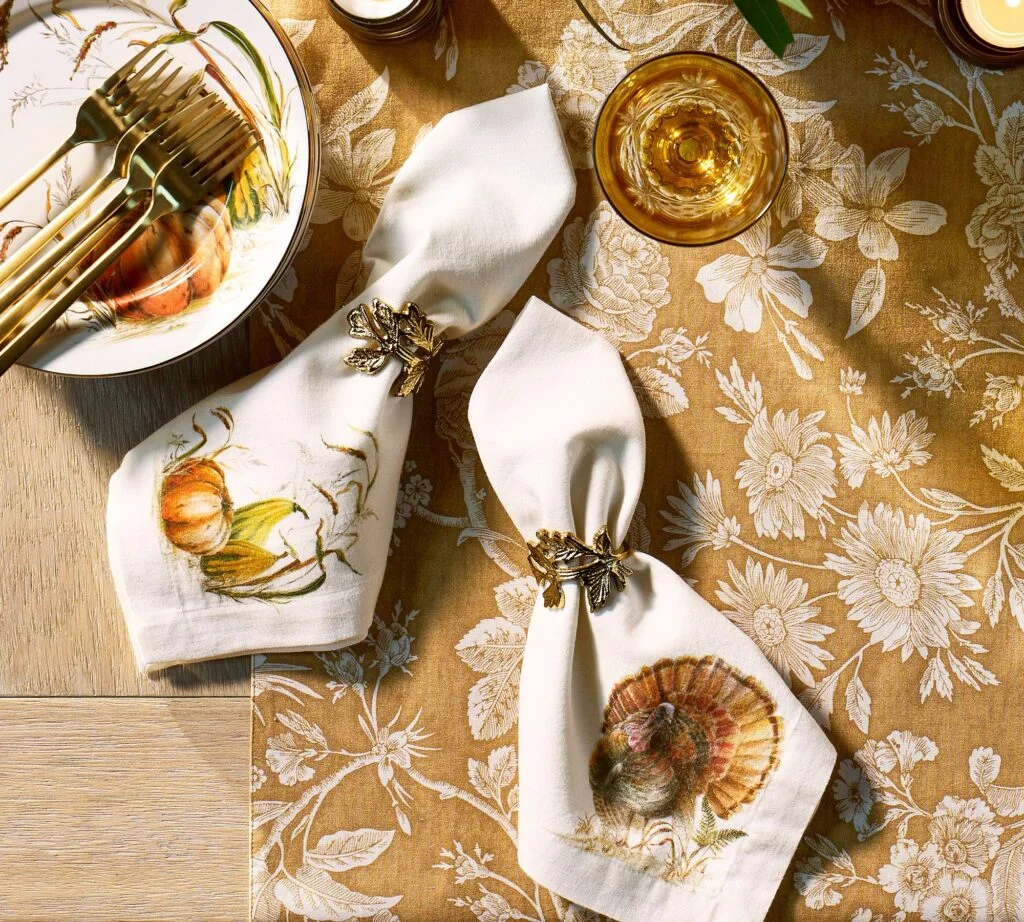 Golf leaf napkin rings around fall-themed napkins